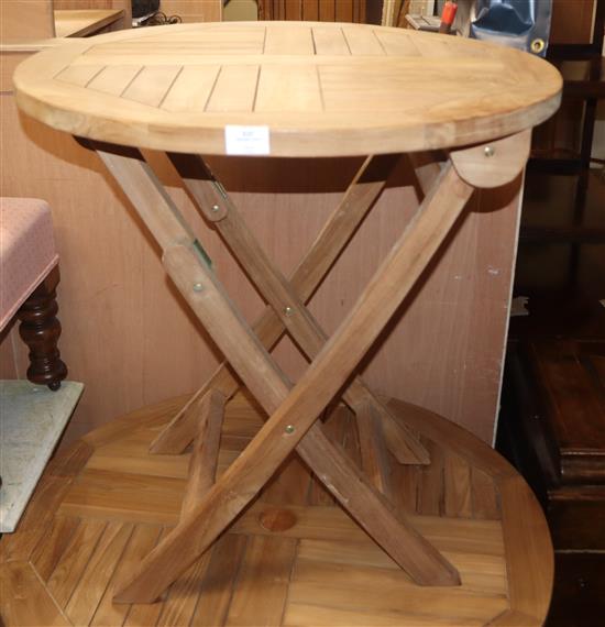 A circular teak circular folding garden table Diam. 70cm